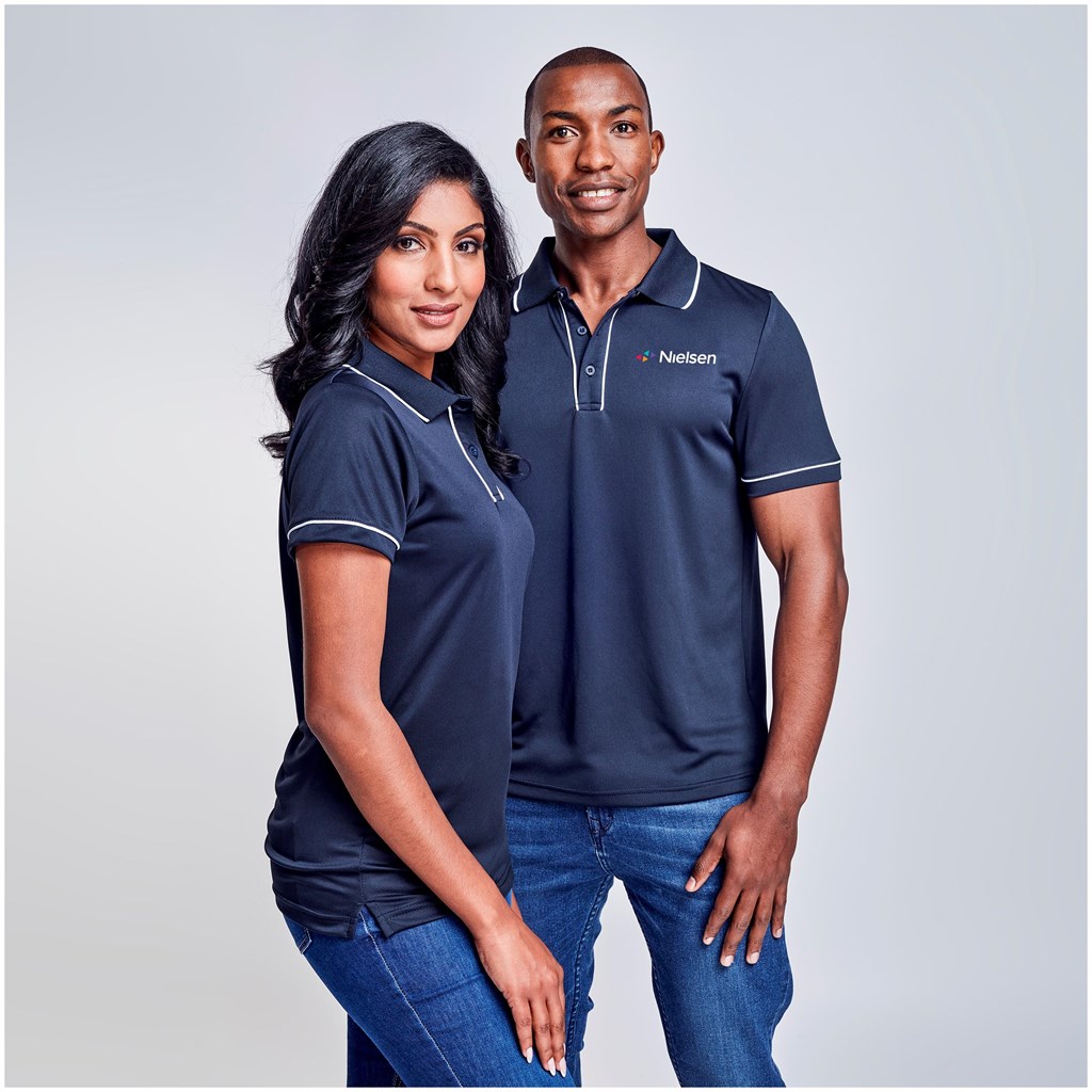 Male and female models wearing navy branded polo shirts.