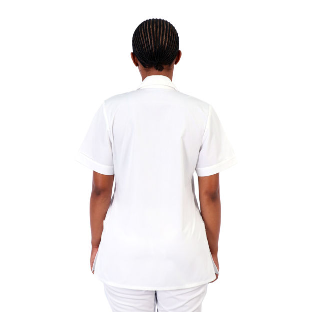 Female model wearing a white beauty therapist uniform from the back.