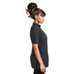 Female model wearing a black healthcare scrub top.