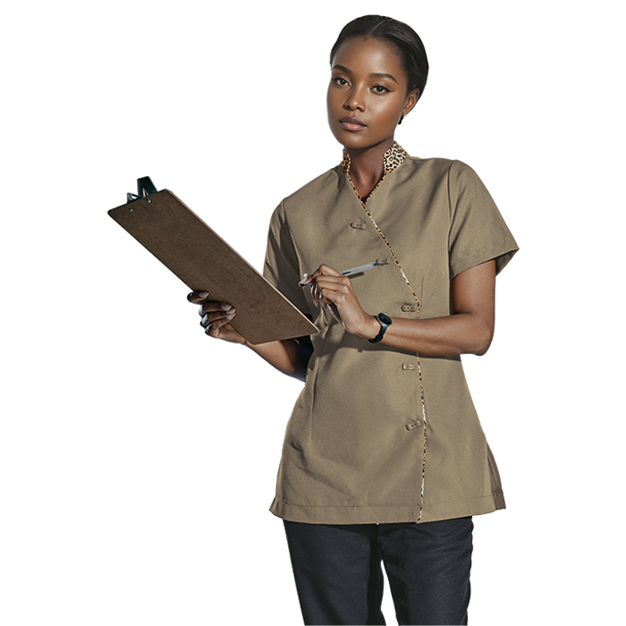 Female model wearing a khaki beauty therapist uniform.