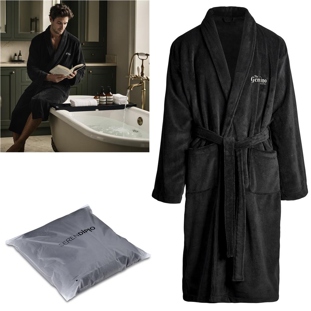 Lifestyle image of a person wearing a black bathrobe indoors.
