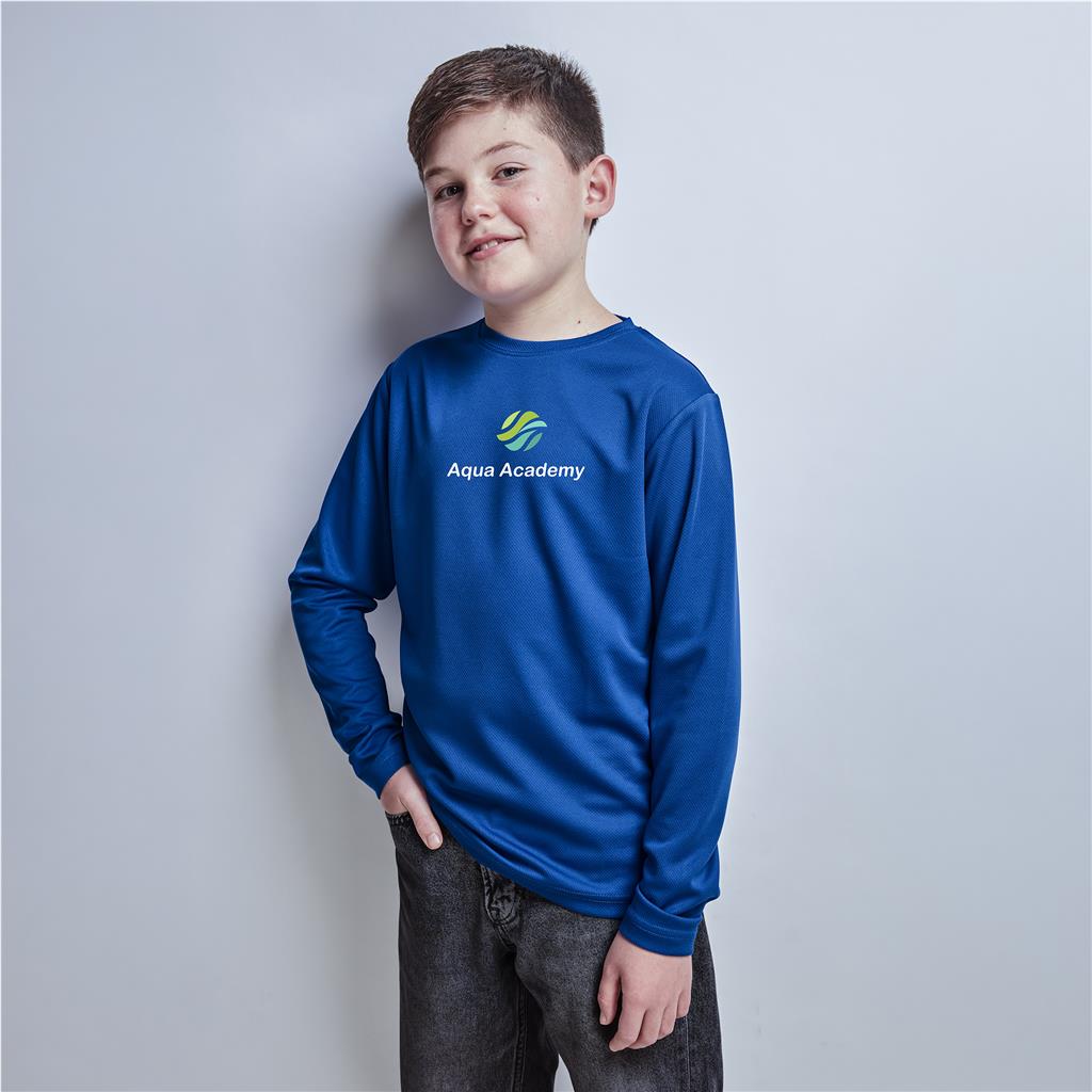 male model wearing a royal blue branded long-sleeve shirt.