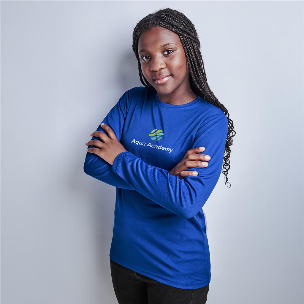 Female model wearing a royal blue long-sleeve branded top.