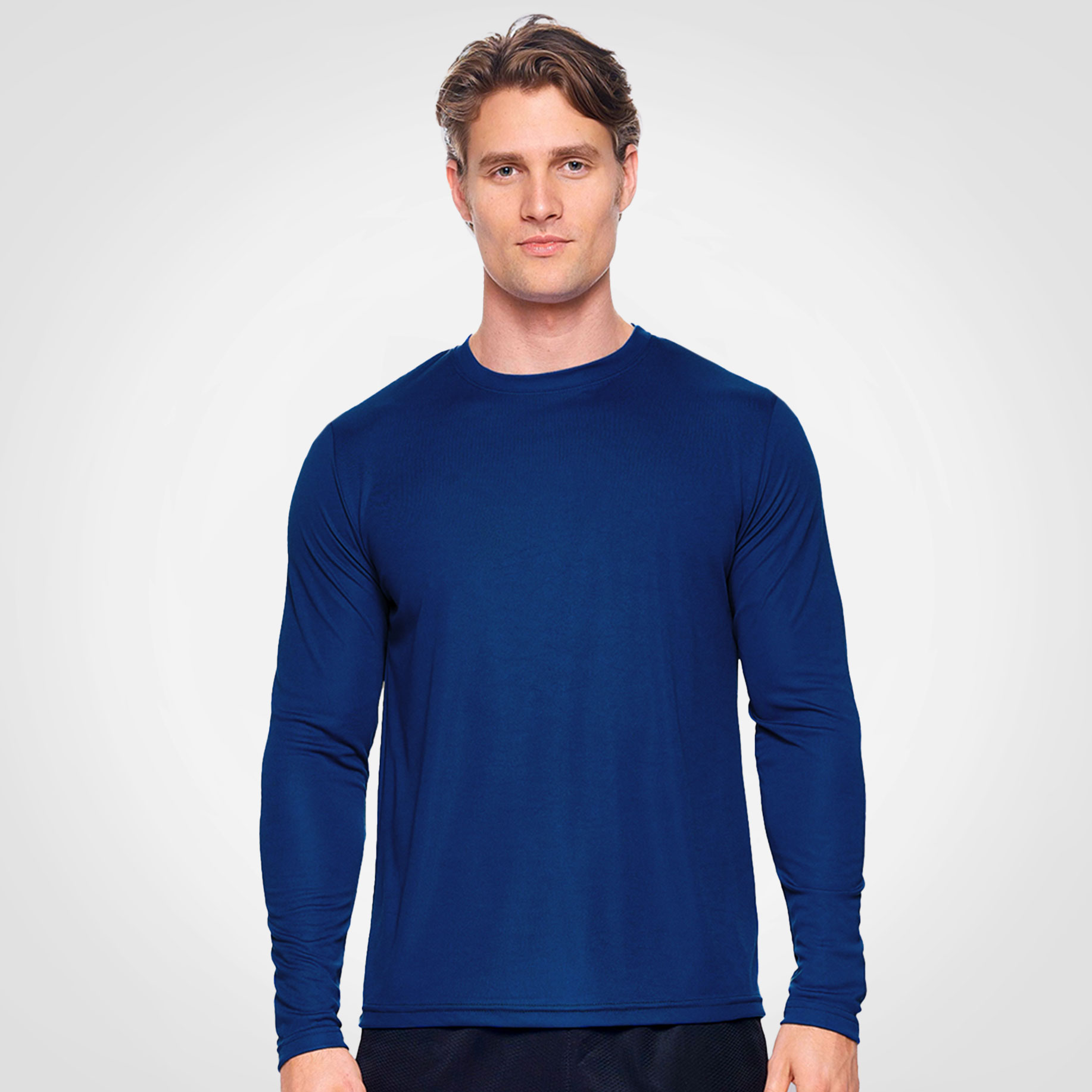 Male model wearing a royal blue knit pullover.