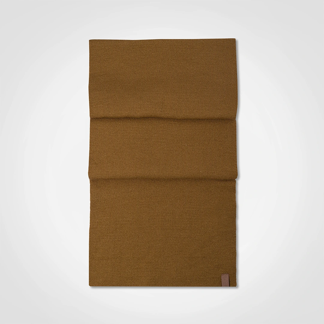 Mustard knit beanie shown from the back.
