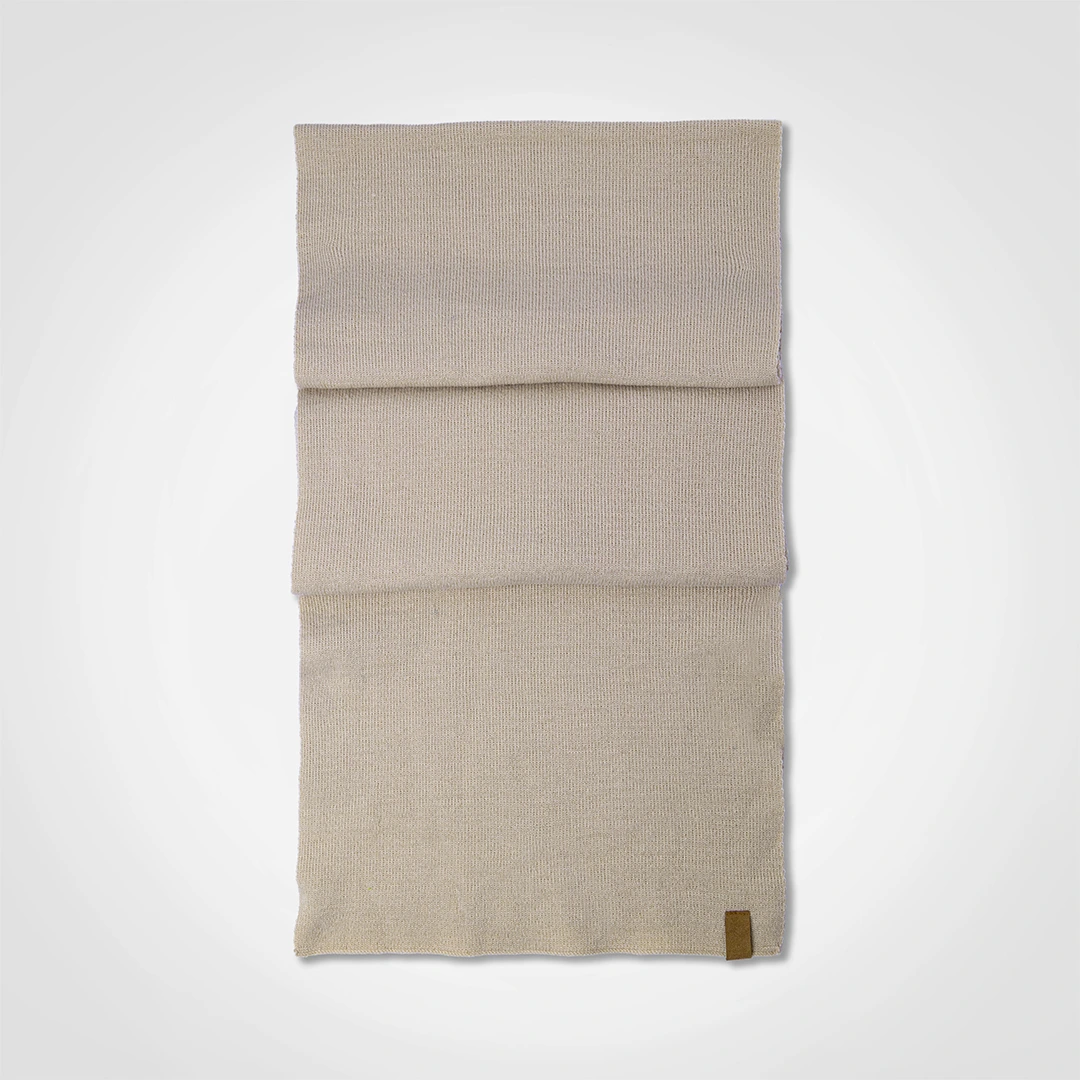 Beige knit beanie shown from the back.