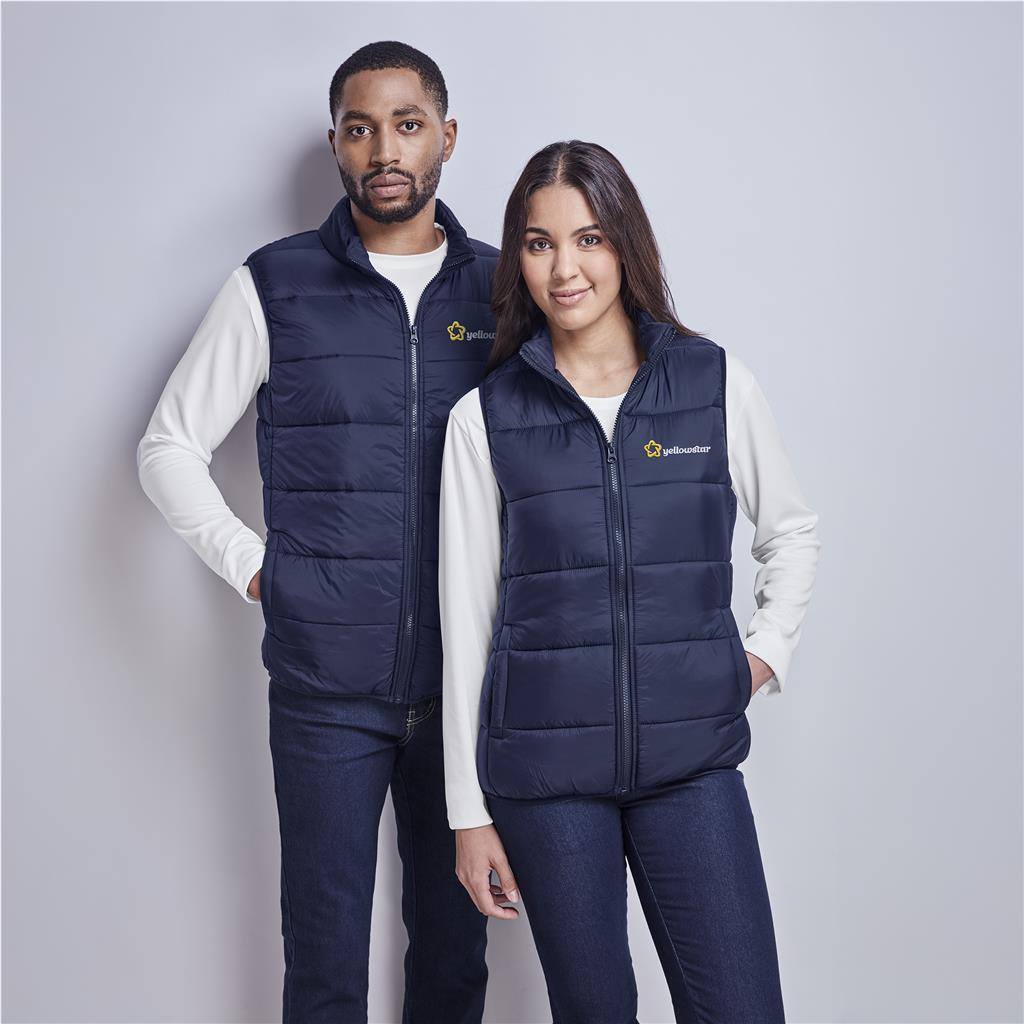 Male and female models wearing Mainline Sportswear navy bodywarmers.