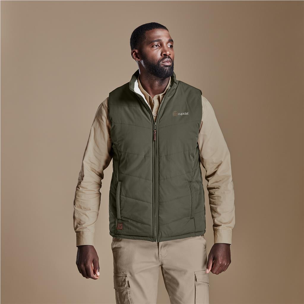 Male model wearing an olive green Mainline Sportswear bodywarmer.
