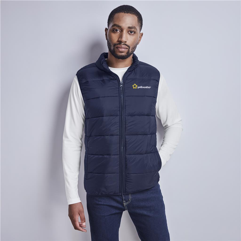 Male model wearing a navy branded bodywarmer.