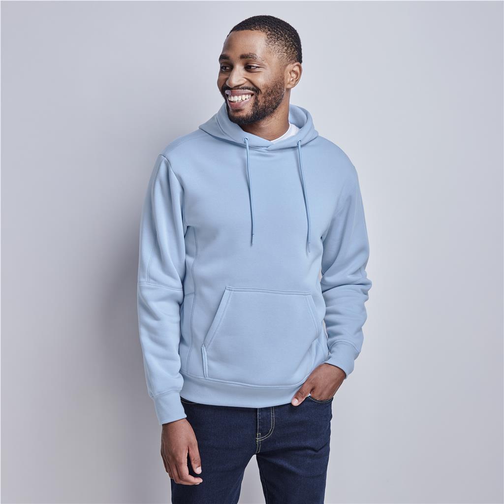 Male model wearing a light blue branded hoodie.