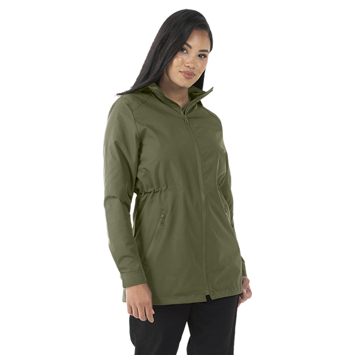 Female model wearing a sage green Mainline Sportswear jacket.