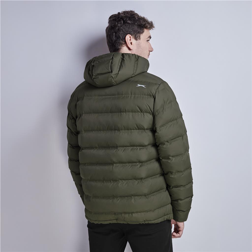 Male model wearing an olive green puffer jacket from a side angle.